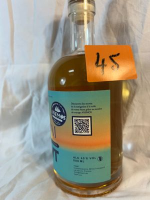 a bottle of alcohol that is sitting on a table