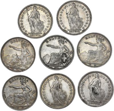 un ensemble de six pièces d'argent sur lesquelles figurent l'effigie d'une femme et d'un homme