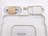 a white tray with a charger and a charger on it