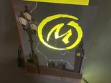 a picture of a picture of a clock tower with a neon sign on it