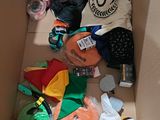 a cardboard box filled with assorted items in it