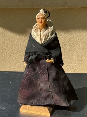 Poupée à tête de cire