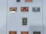 an image of a picture of a collection of stamps on a table