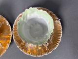 two cups that are sitting on top of each other