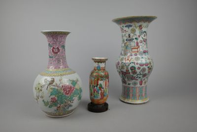 three vases are sitting next to each other on a table