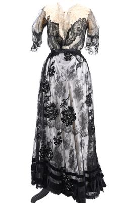 an image of a black and white dress on a mannequin mannequin