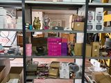 many boxes and boxes on the shelves in the room