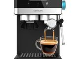 a coffee machine with a cup of coffee on top of it