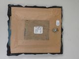 an image of a picture of a piece of paper with a tag on it