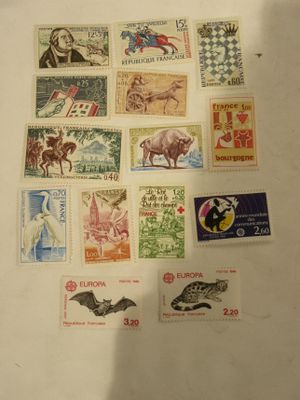 a picture of a collection of stamps on a table