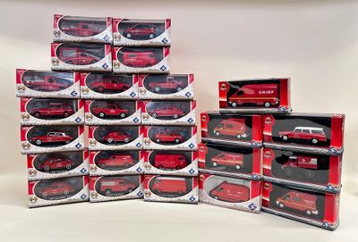 a lot of red and black toy cars on display