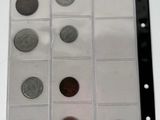 a lot of coins that are in a clear box