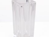 a clear glass vase that is sitting on a table