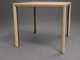 the table is made of plywood wood and has a small square top