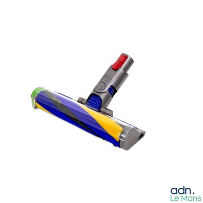 un aspirateur bleu, jaune et rouge sur fond blanc