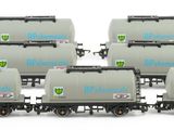a set of six train cars with a lot of seats on them