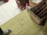 a reflection of a person in a mirror on the floor