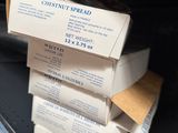 boxes of food are stacked on a shelf in a grocery store