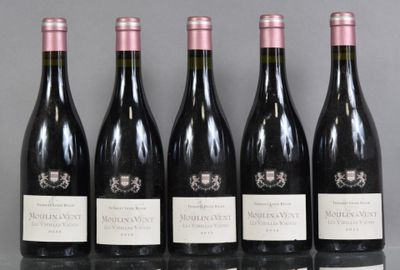 six bottles of wine are lined up in a row on a table