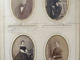 an old photo of a group of people in formal clothing