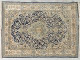 tapis persan ancien à motif de médaillon sur fond bleu