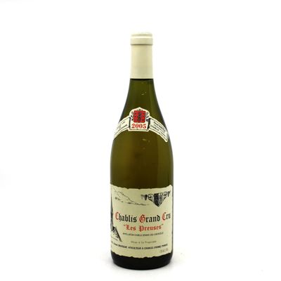 a bottle of wine that is sitting on a table