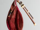 a bag that has a pipe in it hanging from a hook