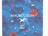 blue box of mauboussin perfume on white background