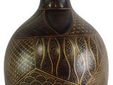 a vase with a design on it on a white background