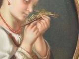 painting of a woman holding a bird in her right hand