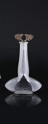 two glass vases that are sitting next to each other