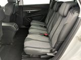 the back seats of a small car are empty in the car