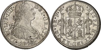a silver coin with the image of a woman in a crown on it