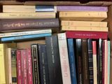 a box full of books sitting on a table