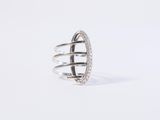 a close up of a ring on a white surface