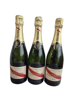 G.H. MUMM Trois bouteilles de champagne brut cordon rouge