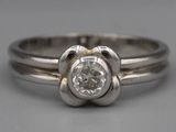 an image of a ring with a diamond in the center