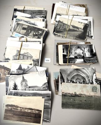 many old photos of a church on a table