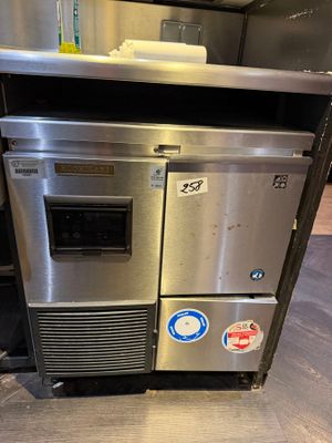 a stainless steel oven sitting in the middle of a kitchen