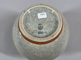 an image of a vase with a lid on a table