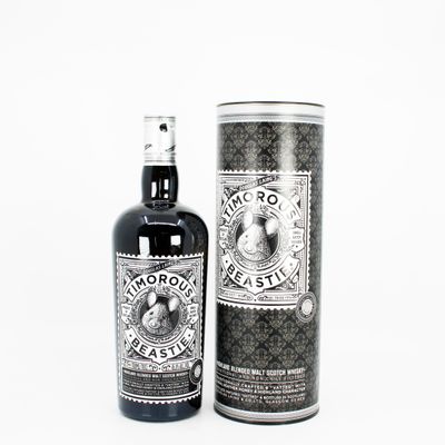 an image of a bottle of liquor sitting next to a canister