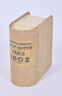 an old book that is sitting on a table