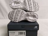 new balance soles for sale in a box on a white background