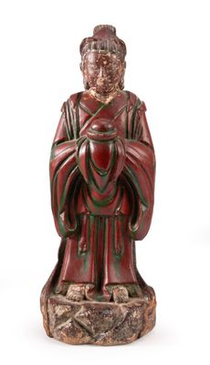 SUJET en bois sculpté et laqué rouge, figurant un serviteur,…