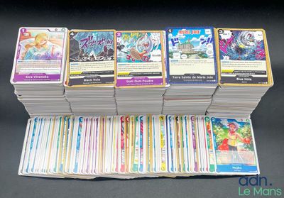 a lot of cards that are stacked on top of each other