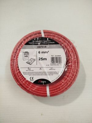 an image of a roll of red electrical wire on a white surface
