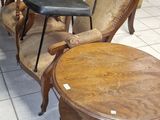 a lot of chairs and tables in a store