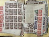many different types of stamps on the pages of a book