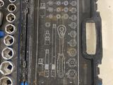 a tool kit that is sitting on a table