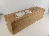a box that is sitting on a table next to a keyboard